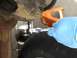 FR Removing brake retaining screw.JPG